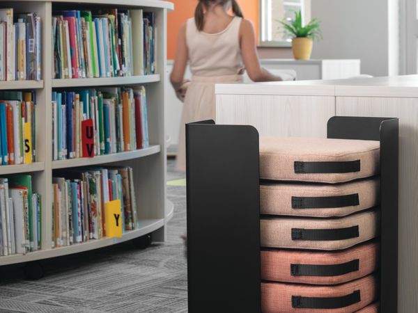 Storyline Bookcases with Confetti Floor Cushions.