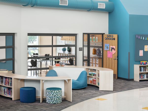 Storyline Bookcases and Bistro Tables with Confetti Floor Lounge and Flock Minis.