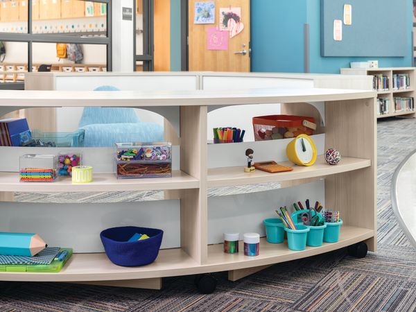 Storyline Bookcases and Bistro Tables with Confetti Floor Lounge.