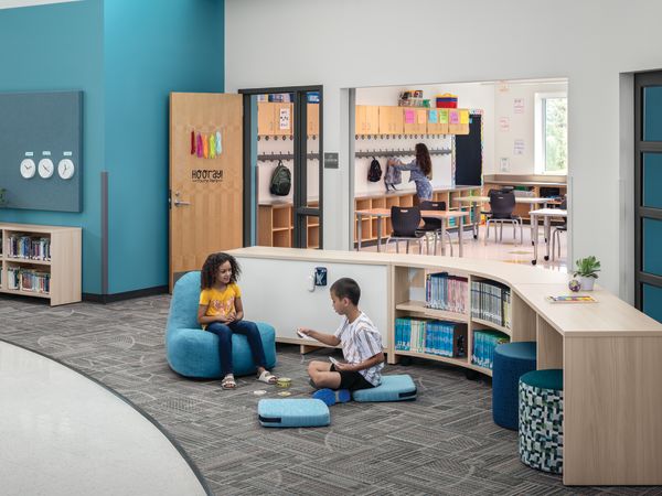 Storyline Bookcases and Bistro Tables with Confetti Floor Cushions and Lounge and Flock Minis.
