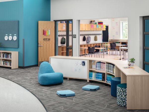 Storyline Bookcases and Bistro Tables with Confetti Floor Cushions and Lounge and Flock Minis.