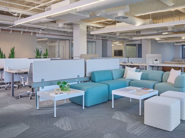 SocCo shown with Sculpt tables and Flock lounge seats, next to Gravitation power beam & screens with Coordinate height adjustable desks, fuse storage, and ignition 2.0 seating. 