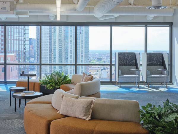 SoCo shown with Sculpt personal tables and Sculpt planters. 