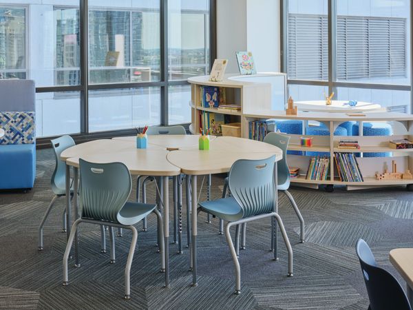 Build Cresent desks in a circle with SmartLink chairs, and Storyline storage in the background. 