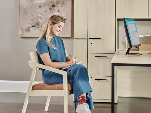 Confer chair with Concinnity desk