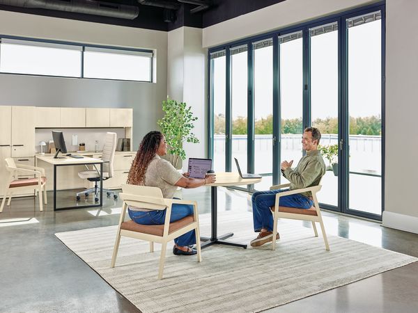 Confer chair with Concinnity desk with Arrange table