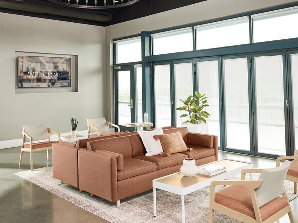 Confer chair with West Hill sofa and Sculpt tables 