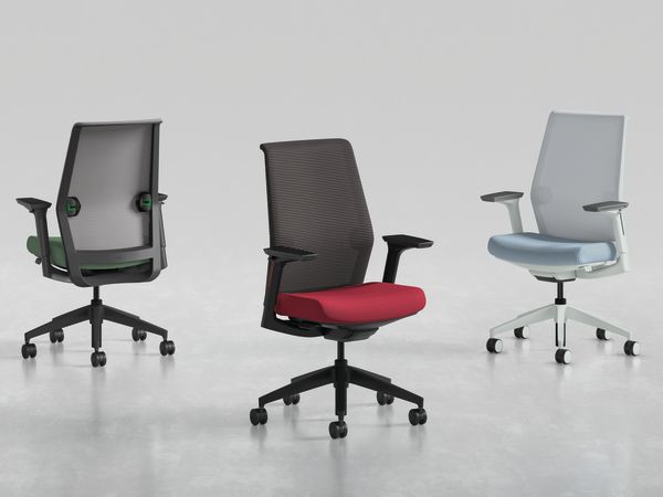 Three modern office chairs with different designs and colors, including black, red, and gray, are displayed on a plain white background.