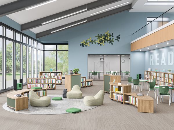 Alt Attribute: School media center with rows of linear and curved Storyline bookcases to create space division for reading or studying.