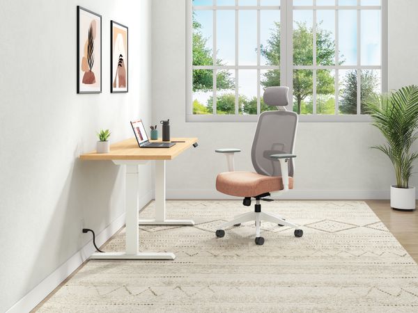 Height adjustable desk and task chair in a home office 