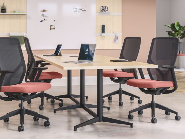 Preside conference table with Flexion task chairs and Workwall markerboard tile, fabric tile and laminate tiles.