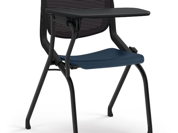 Black mesh-back chair with blue seat and attached writing tablet.