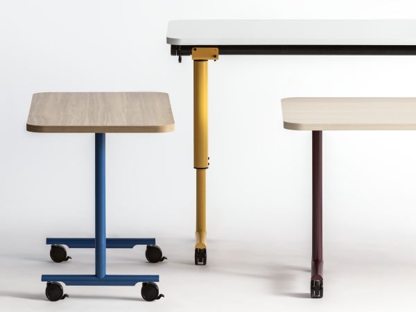Assorted Field Trip Tables with painted legs.