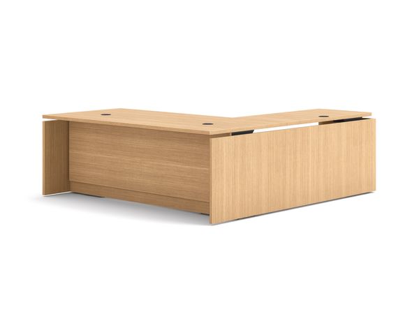 L-shaped executive workstation with woodgrain finish, integrated power access, and pedestal file storage.