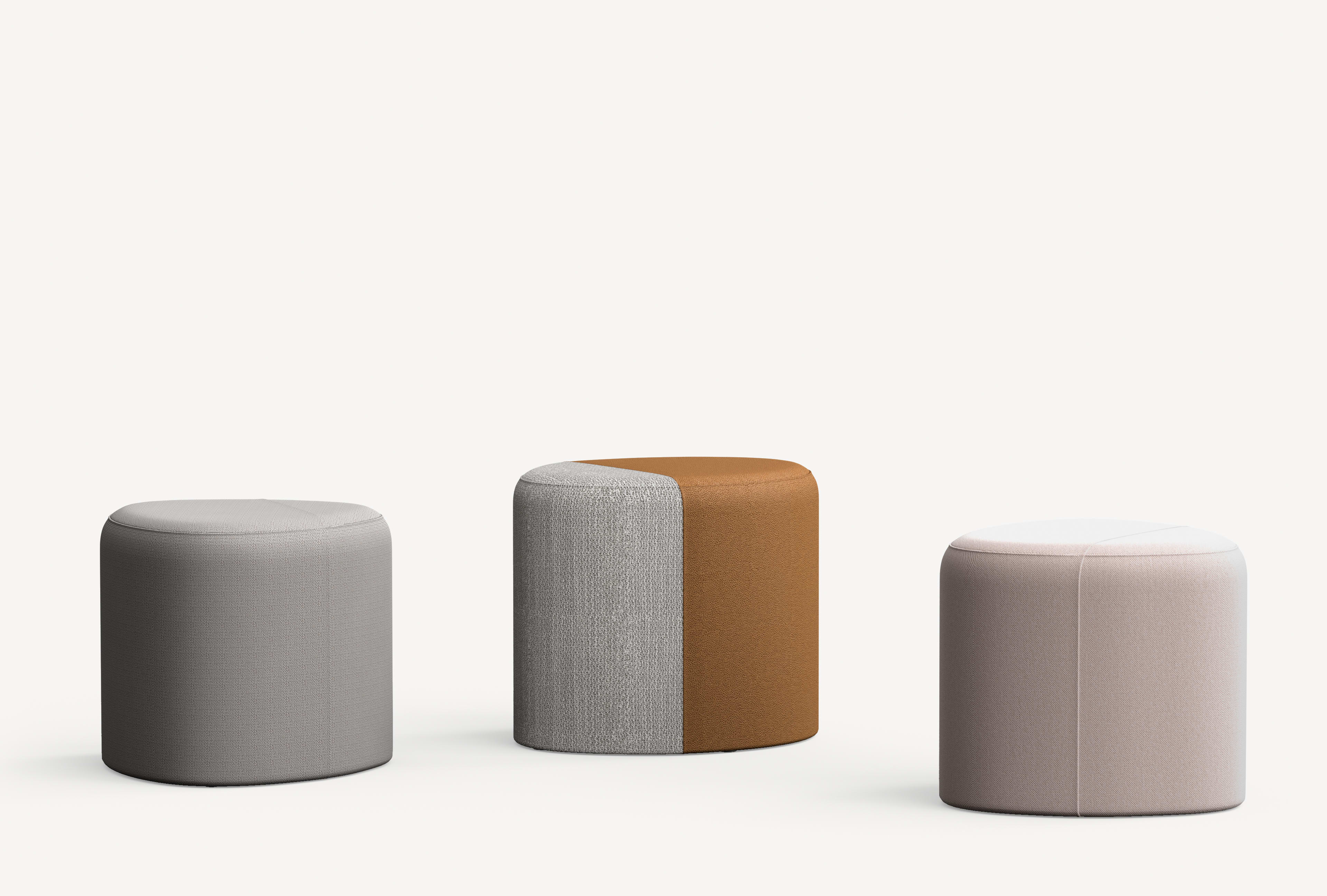 Set of three Allsteel Two-third poufs in grey leather, half light grey upholstery and half tan upholstery and light pink upholstery.