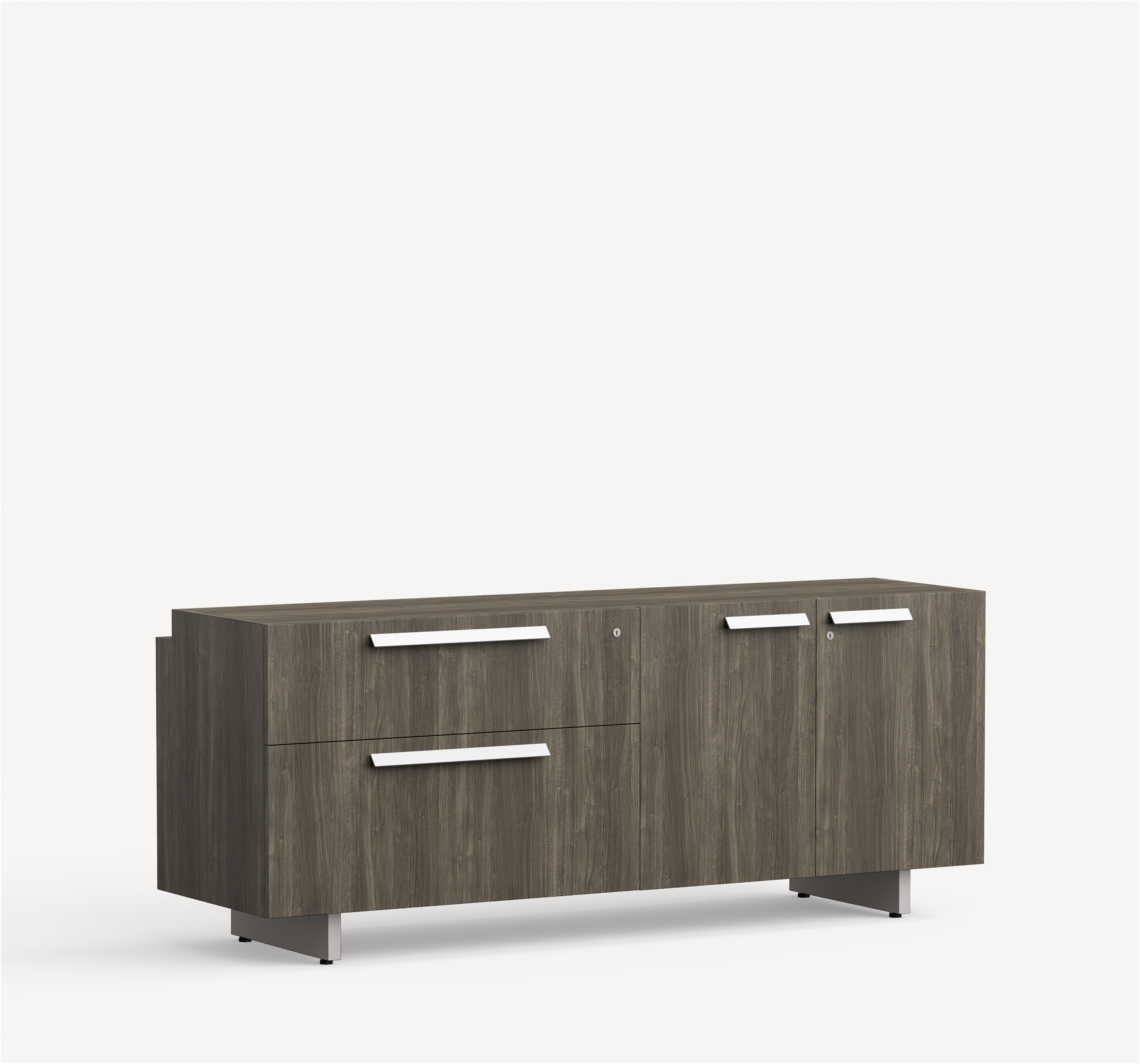 Approach Credenza in brownish grey wood with right-sided hinged doors, one box and one file drawer on the left and silver handles.