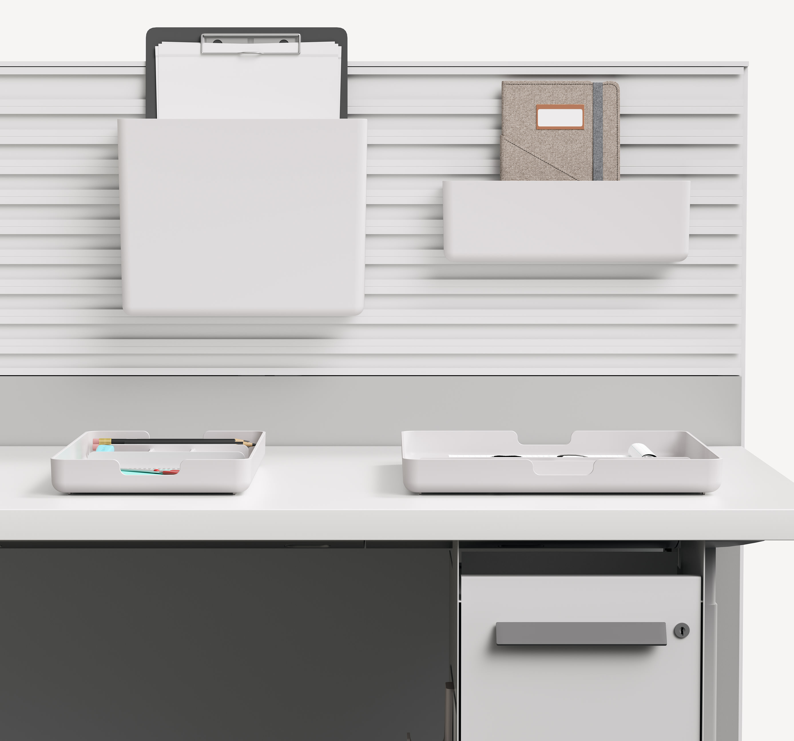 Modern workstation storage including paper file, paper tray, and organization bins.