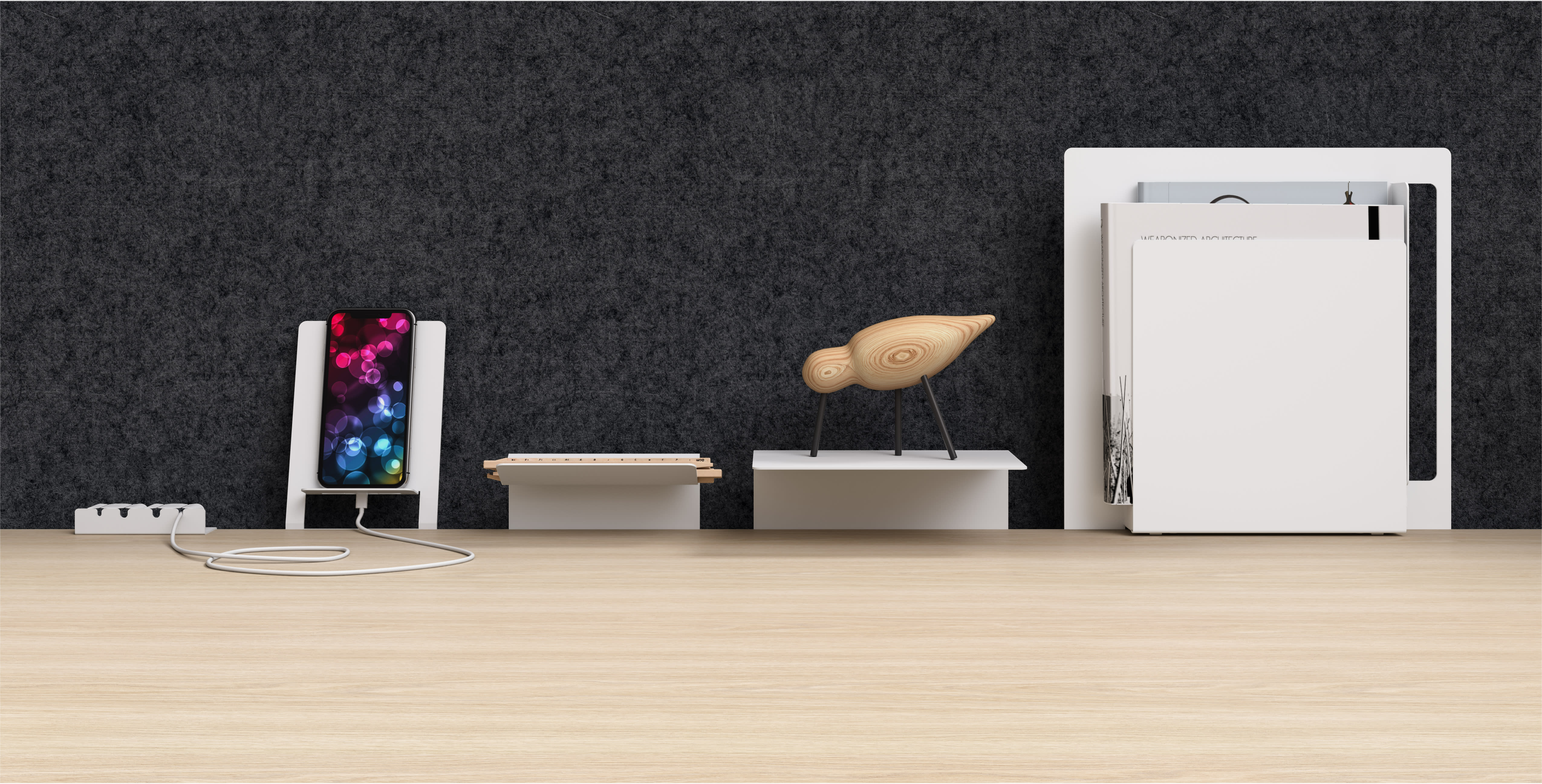 Modern white desktop accessories mounted to worksurface including phone stand, paper filing, and shelves.