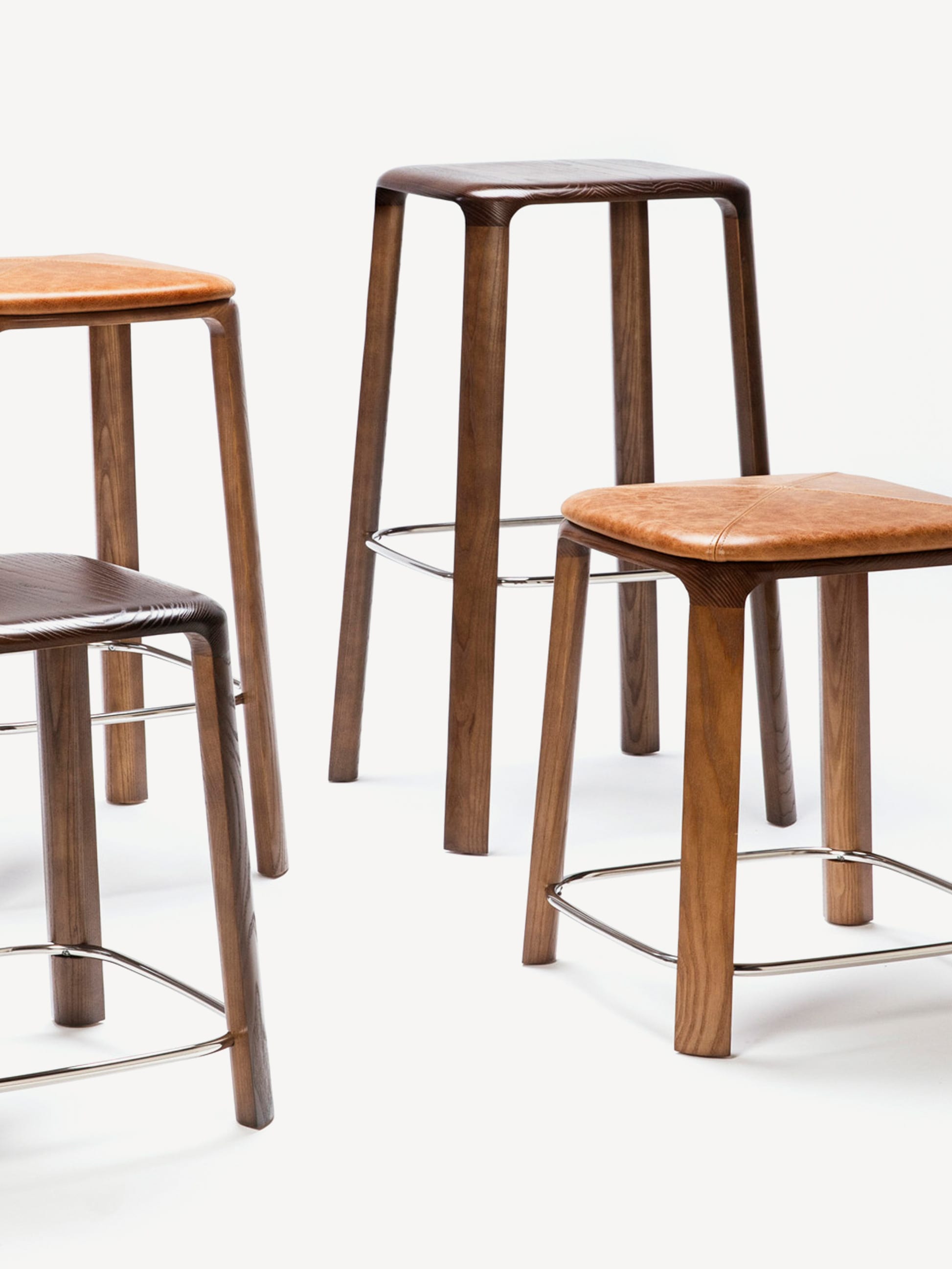 Array of Gunlocke Trilla stools in counter height, bar height and standard height.