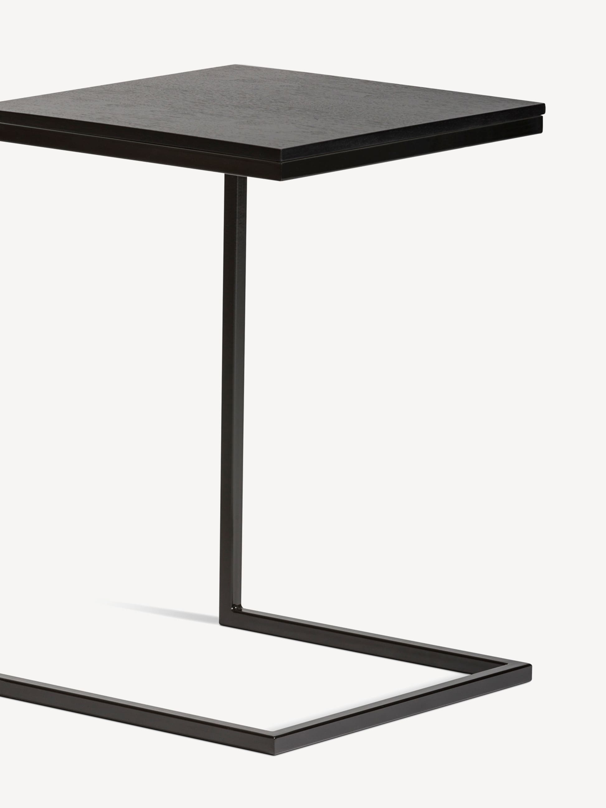 Detail view of the Gunlocke Calm laptop table in black.