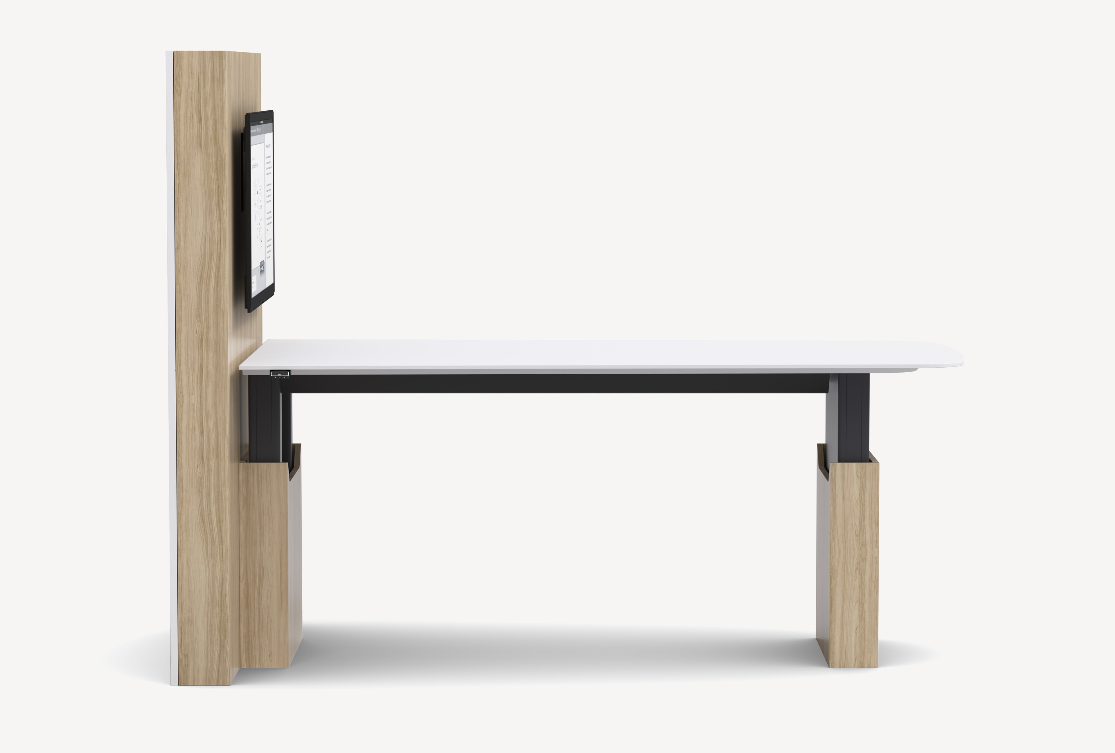 Side view of the Gunlocke Briefing height-adjustable table with media wall in light wood with a white table top.