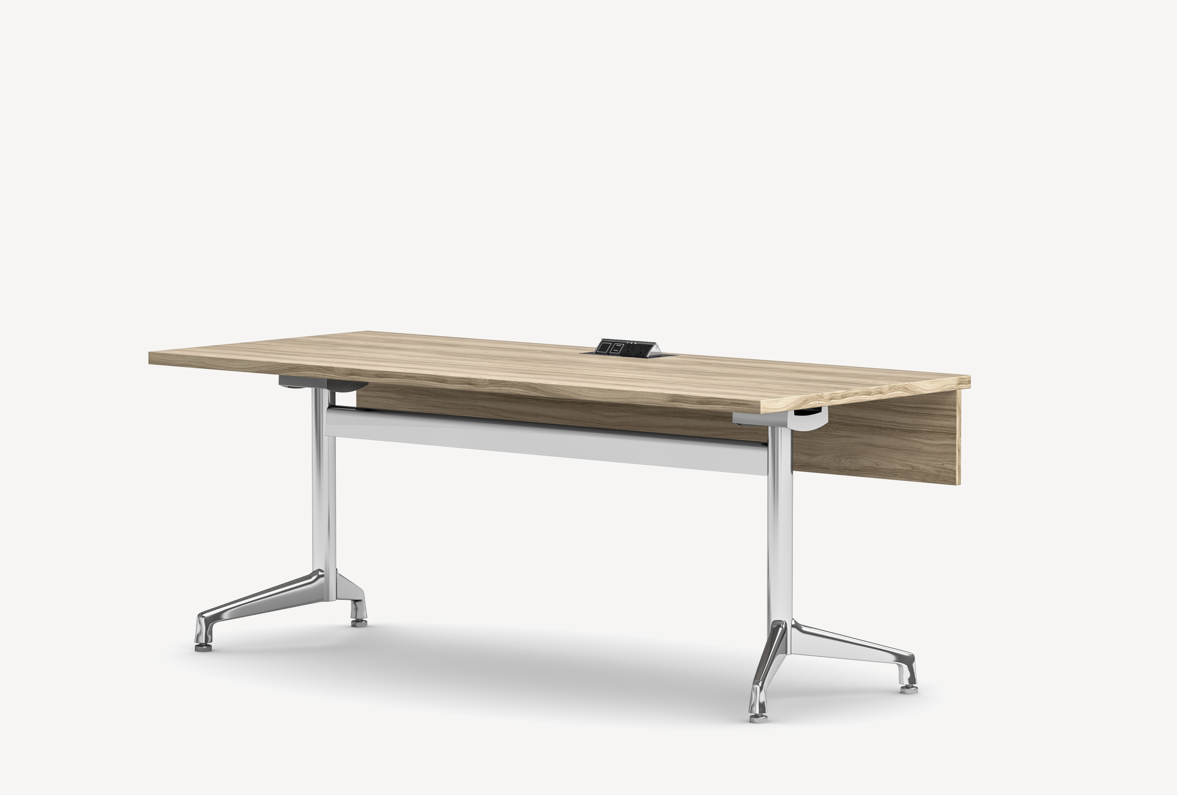 Three-quarter front view of the Gunlocke Briefing training table with light wood top, exposed power cutout, modesty panel, wire management and metal Y base.