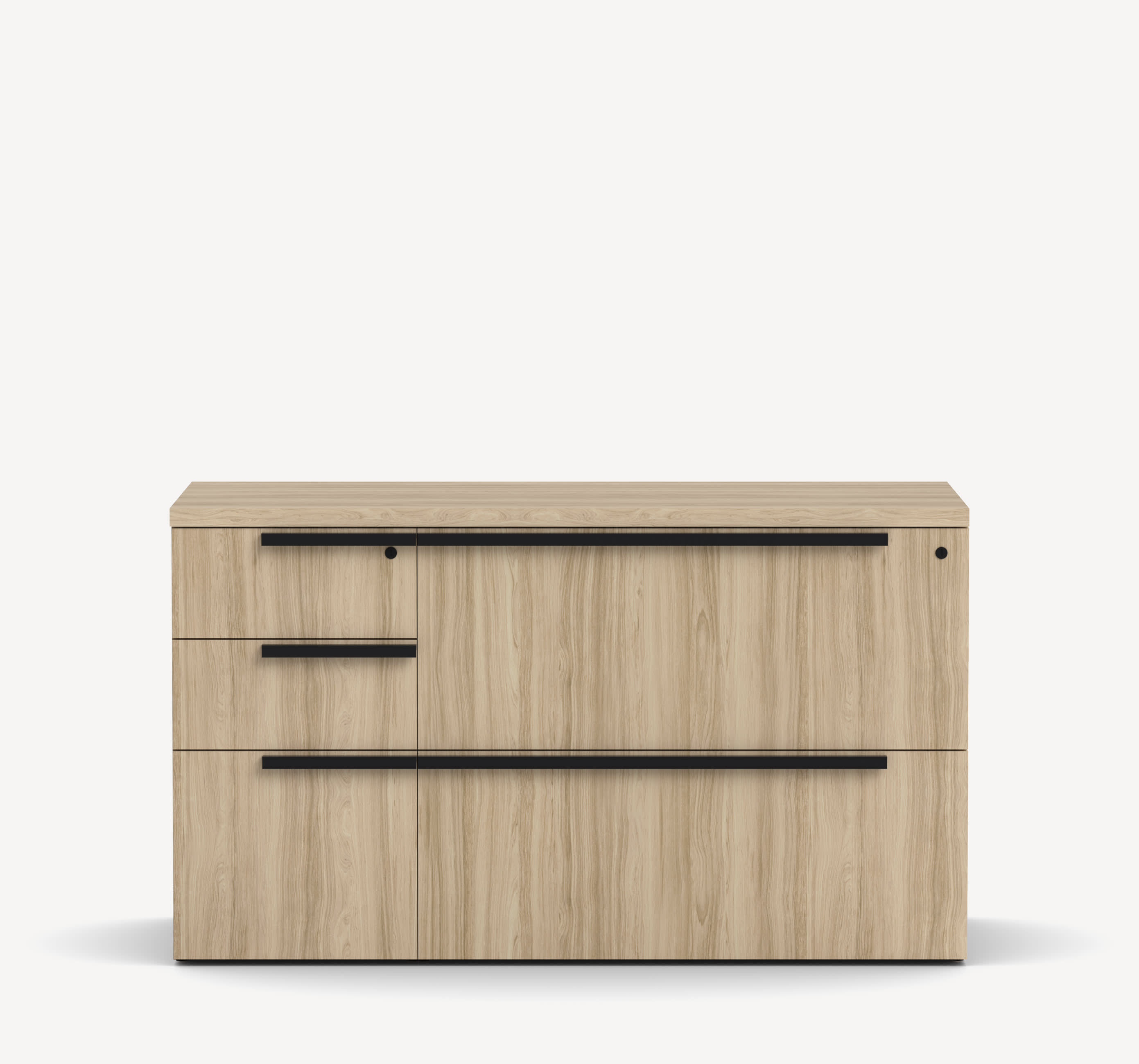 Gunlocke Silea Lateral File Credenza in light wood with two later file drawers on the right, three drawers on the left and black handles.