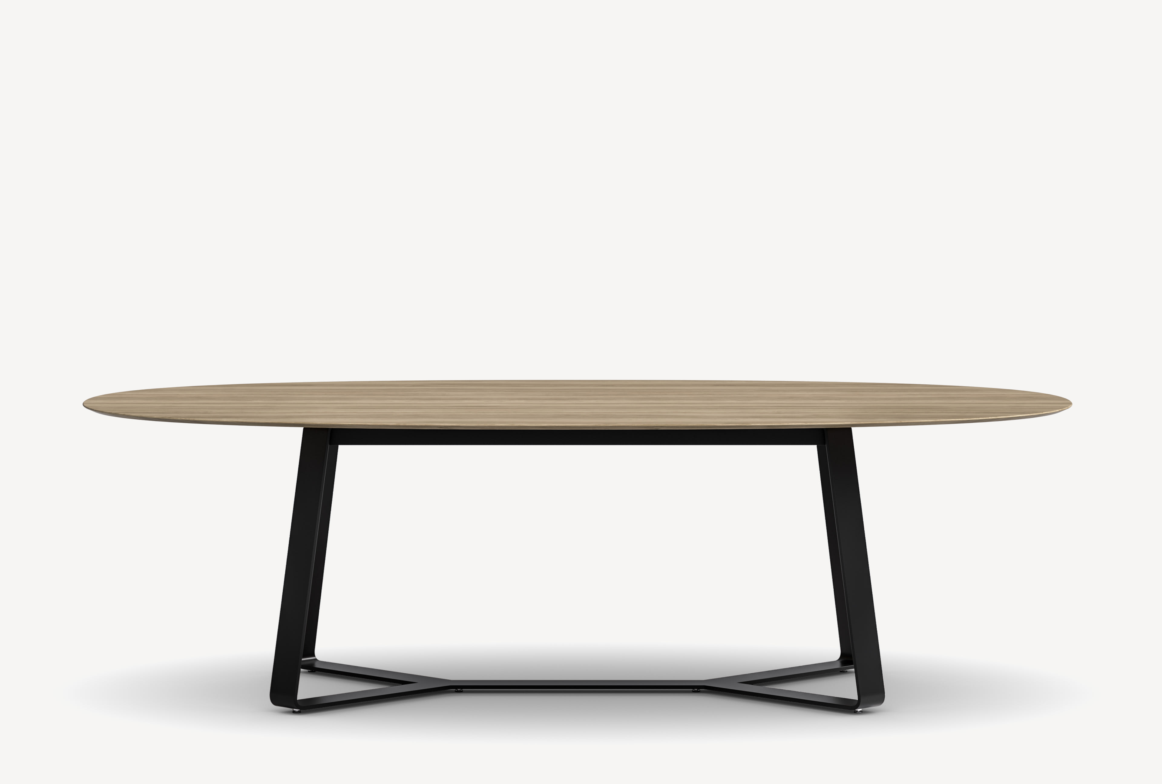 Front view of a Gunlocke Briefing conference table with light wood ellipse top and black metal ribbon Y base.