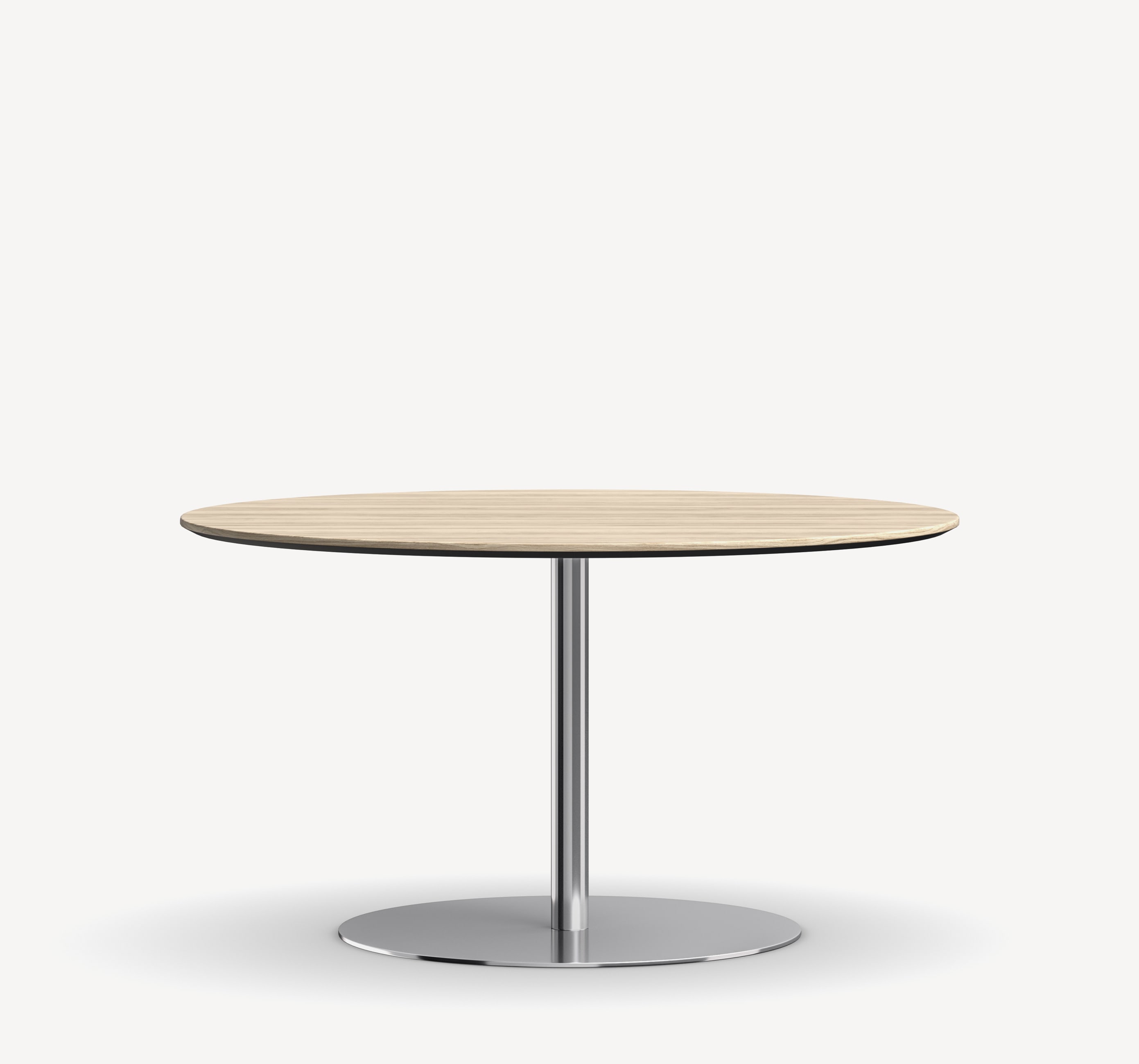 Round Briefing Occasional table with light wood table top and metal disc base.