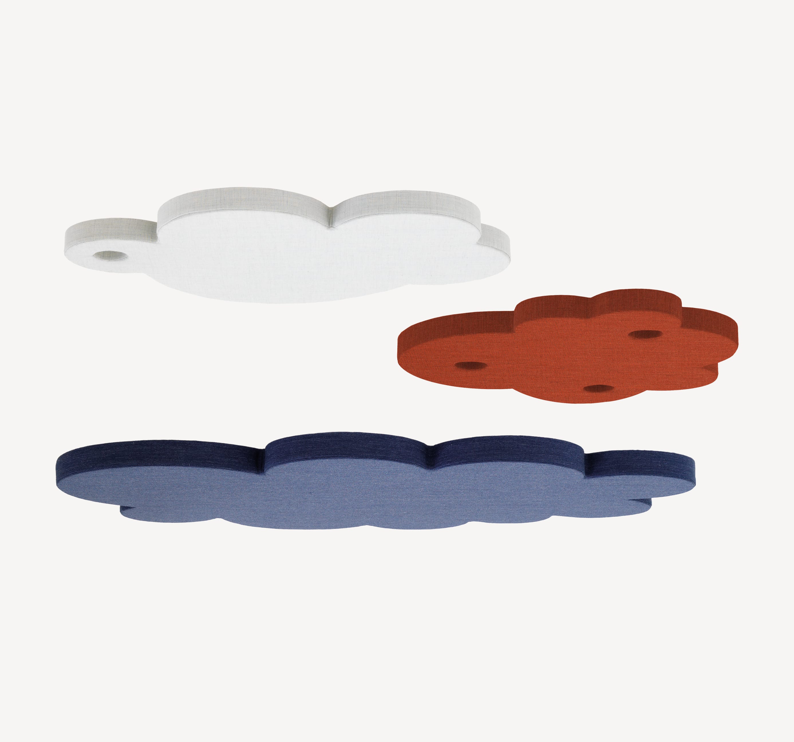 Zilenzio Cloudz Ceiling Sound-Absorbers in red white and blue that hang in layers on top of each other.