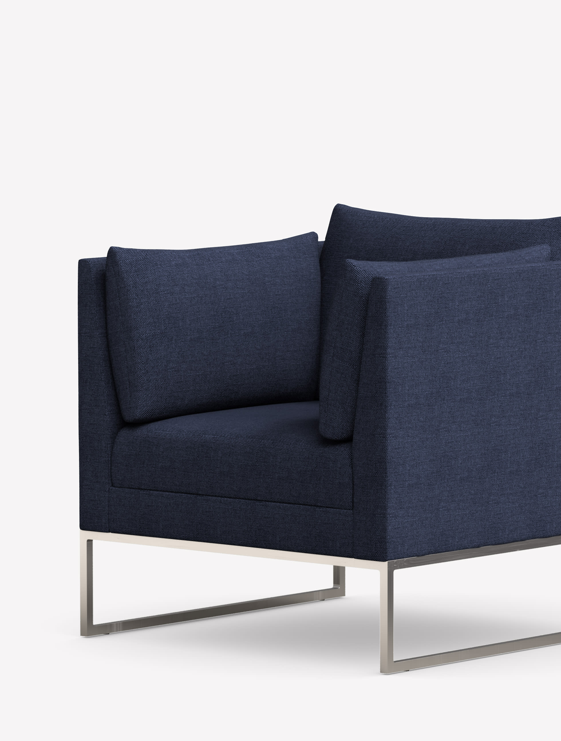 Three-quarter front view of the Gunlocke Calm club chair with silver sled base and navy blue upholstery.