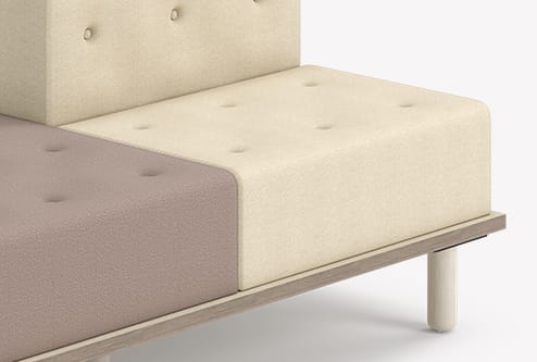 Close-up of an Allsteel Rise Platform Lounge configuration in dark grey fabric.