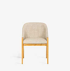 Front view of the Calia side chair with light wood frame and light beige upholstery.