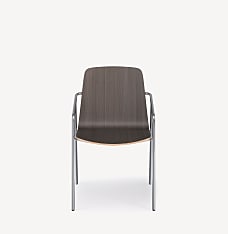 Front view of the 4-leg Liv guest armchair with chrome frame and skyline walnut shell.