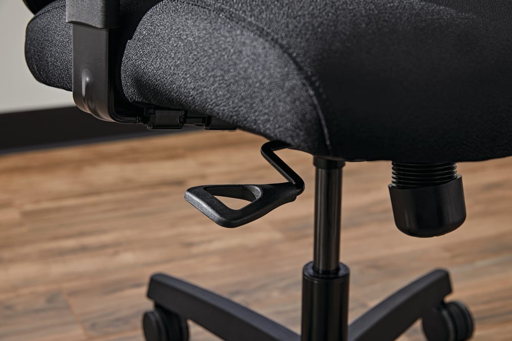 <h1>What does the knob under an office chair do?</h1>