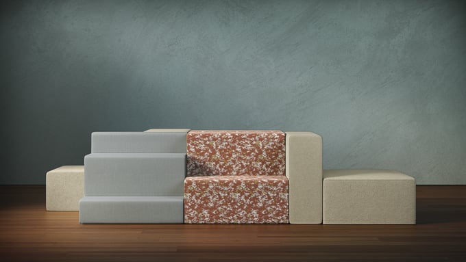 Allsteel Rise lounge seating in Daydreamer and Moody Moss fabrics from HBF Textiles in a room with dramatic lighting.