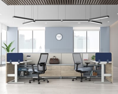 A modern and minimalist office space with sleek furniture, large windows, and a minimalist lighting fixture overhead.