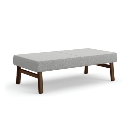 Gray modular bench seating with wood legs.