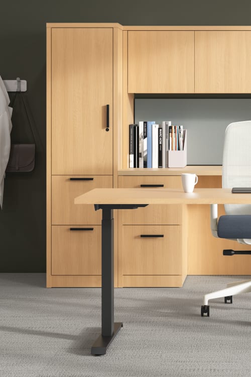10500 Series executive office shown with a height-adjustable workstation and Nucleus task chair