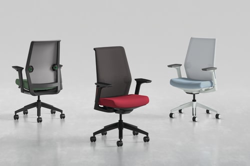 Three modern office chairs with different designs and colors, including black, red, and gray, are displayed on a plain white background.