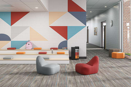 Confetti Floor Lounge and Floor Cushions with Confetti Storage Cart and Tangram Poufs.