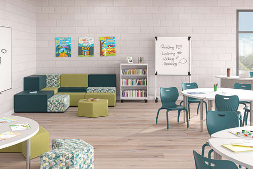 Classroom featuring HON Tangram reading nook near SmartLink student chairs and Build desks.