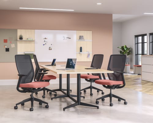 Preside conference table with Flexion task chairs and Workwall markerboard tile, fabric tile and laminate tiles.