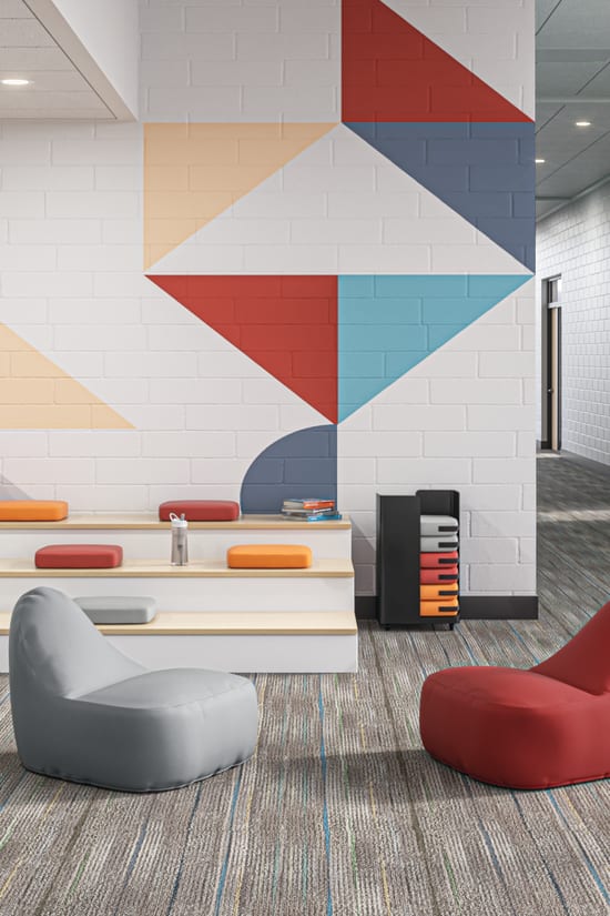 Confetti Floor Lounge and Floor Cushions with Confetti Storage Cart and Tangram Poufs.