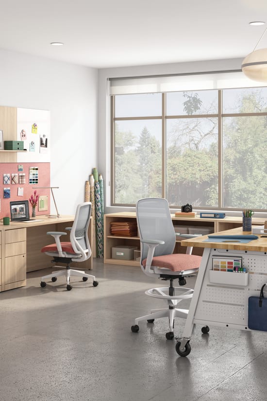 A designer's space featuring Nucleus task chairs and stools with 10500 Series storage and Makerspace tables.