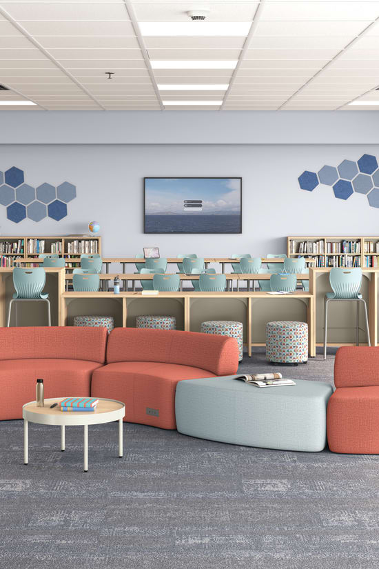 A modern and inviting library or study space with comfortable seating arrangements, bookshelves, and decorative elements in a color palette of blues, grays, and coral.