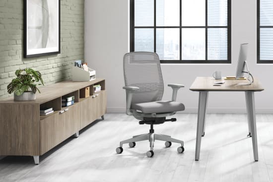 A private office setting featuring Nucleus task and guest seating with Voi desk and storage.