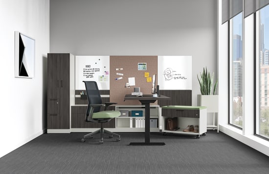 A modern, minimalist home office setup with a desk, chair, and various storage and organizational elements, set against a bright, airy backdrop with large windows.