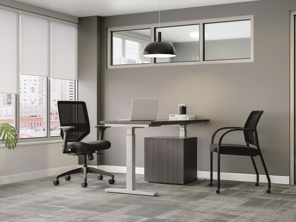 Coordinate height-adjustable base with Mod worksurface in Sterling Ash with Solve and Ignition seating