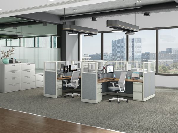 Accelerate workstations shown with Ignition task chairs and Brigade storage.